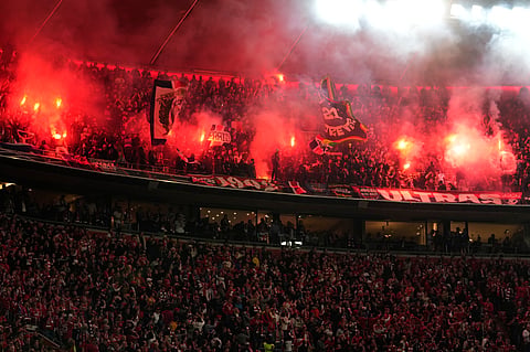 Fans cheer prior the Champions League semifinal second leg soccer match between Bayern Munich and Paris Saint Germain in Munich