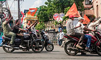 PTI : BJP supporters celebrate party's lead near the residence of West Bengal Chief Minister Mamata Banerjee during vote tabulation on the day of Assembly election results, in Kolkata.