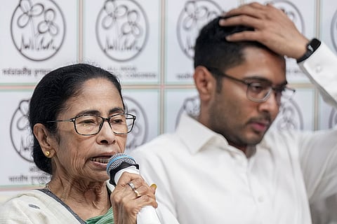 Outgoing West Bengal Chief Minister and TMC supremo Mamata Banerjee addresses a press conference, at her Kalighat residence in Kolkata, Tuesday, May 5, 2026. Party MP Abhishek Banerjee also seen.