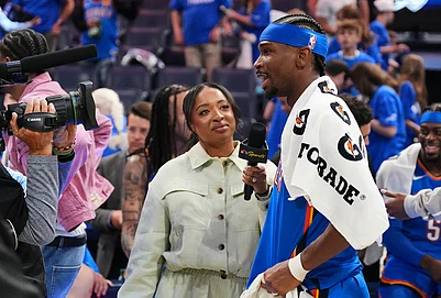 | Photo: AP/Kyle Phillips : Oklahoma City Thunder guard Shai Gilgeous-Alexander, right, gives a broadcast interview after the teams Game 1 in a second-round NBA basketball playoffs series against the Los Angeles Lakers in Oklahoma City.