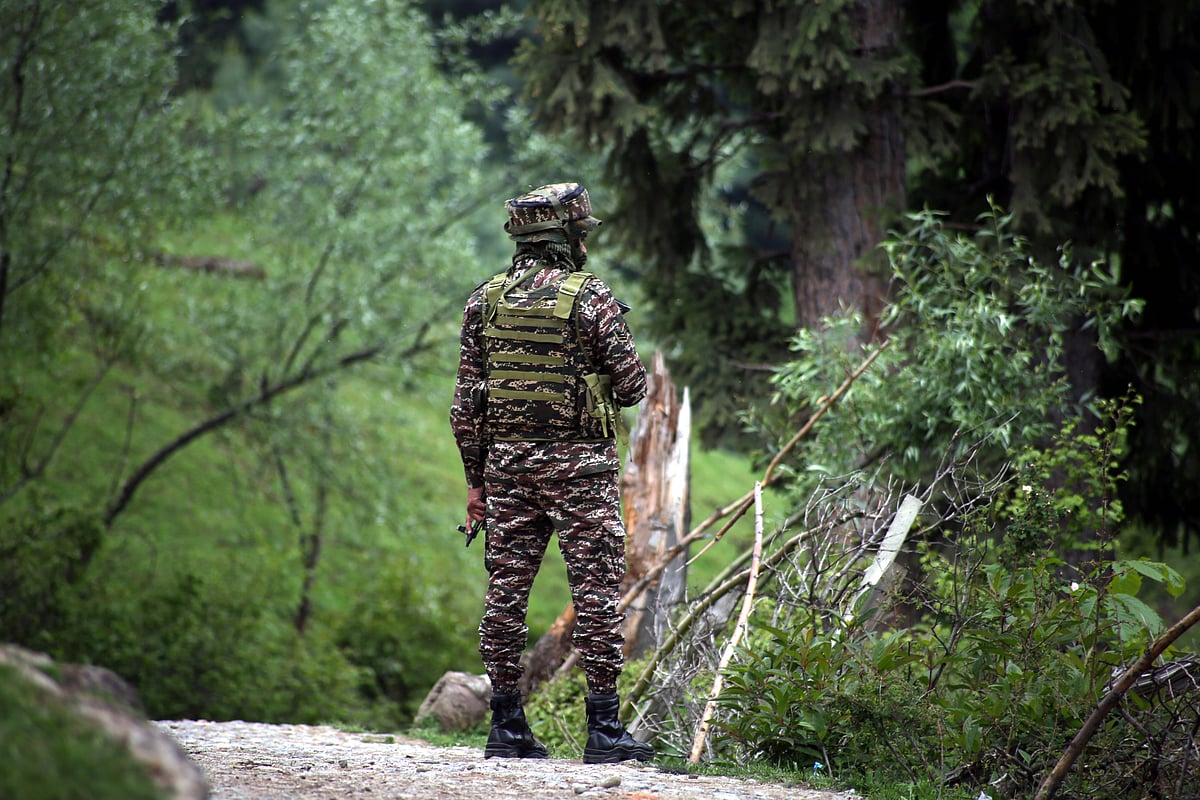 ​
CRPF troop member standing guard in Jammu and Kashmir's Shopian district - IMAGO