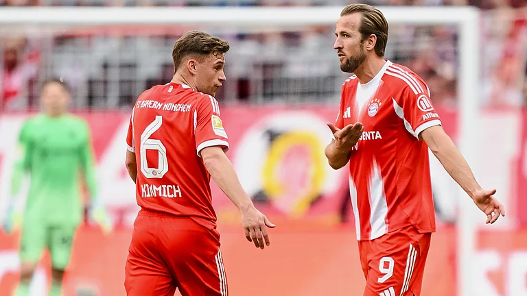 Bayern's Joshua Kimmich, left, and Harry Kane react during a German Bundesliga soccer match between Bayern Munich and 1. FC Heidenheim in Munich, Germany, Saturday, May 2, 2026. - | Photo: AP/Harry Langer
