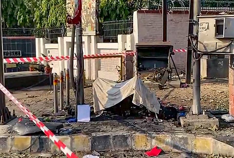 The remains of a scooter after a fire incident near the BSF headquarters at BSF Chowk, in Jalandhar.