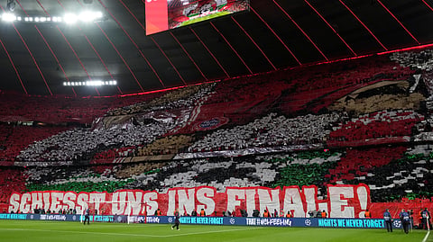 Bayern fans cheer prior the Champions League semifinal second leg soccer match between Bayern Munich and Paris Saint Germain in Munich, Germany.