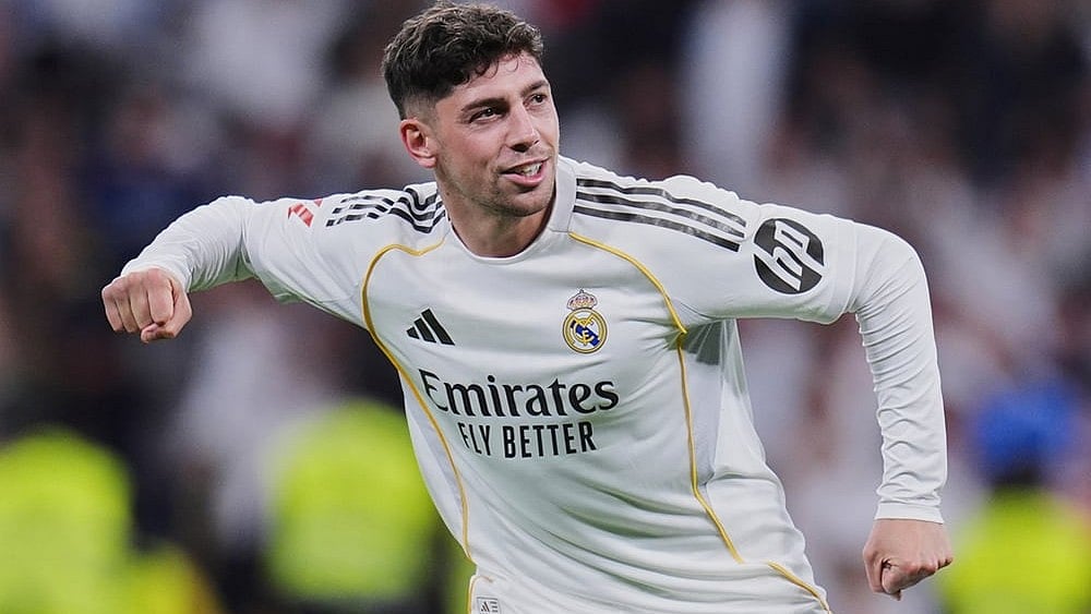 Real Madrid's Federico Valverde celebrates after scoring the opening goal during a Spanish La Liga soccer match between Real Madrid and Girona in Madrid, Spain. - | Photo: AP/Manu Fernandez