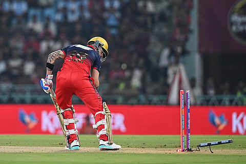 Royal Challengers Bengaluru's Virat Kohli is bowled out by Lucknow Super Giants' Prince Yadav during the Indian Premier League cricket match between Royal Challengers Bengaluru and Lucknow Super Giants in Lucknow, India.