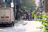 | Photo: PTI : Police personnel investigate after BJP leader Suvendu Adhikari's personal assistant Chandranath Rath was allegedly shot dead, in Madhyamgram, North 24 Parganas district.