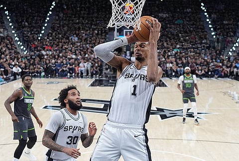 San Antonio Spurs forward Victor Wembanyama (1) grabs a rebound during the first half in Game 2 of a second-round NBA playoffs basketball series against the Minnesota Timberwolves in San Antonio.