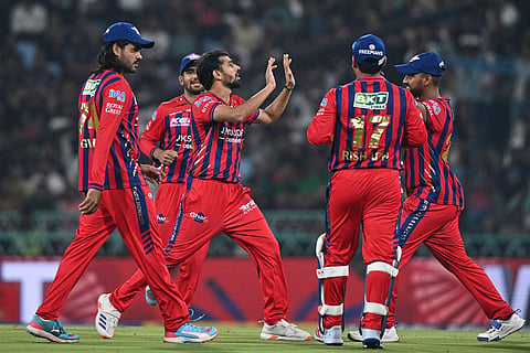Lucknow Super Giants' Prince Yadav, center without cap, celebrates with teammates the wicket of Royal Challengers Bengaluru's Virat Kohli during the Indian Premier League cricket match between Royal Challengers Bengaluru and Lucknow Super Giants in Lucknow, India.