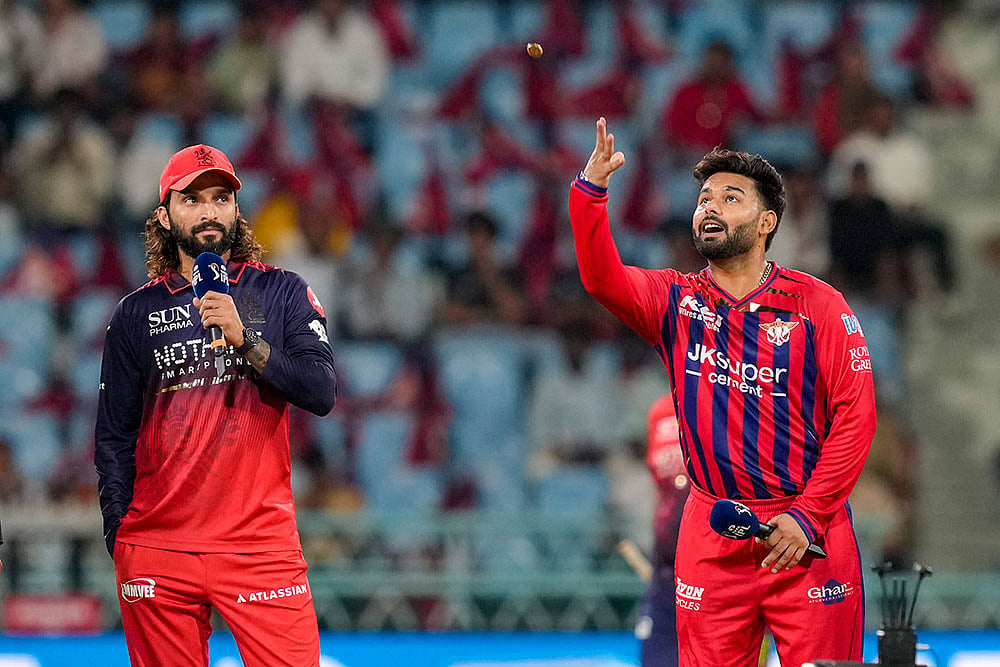 Lucknow Super Giants' Rishabh Pant, right, and Royal Challengers Bengaluru's captain Rajat Patidar at toss before the Indian Premier League (IPL) 2026 T20 cricket match between Lucknow Super Giants and Royal Challengers Bengaluru, in Lucknow, Uttar Pradesh. - | Photo: PTI/Shahbaz Khan