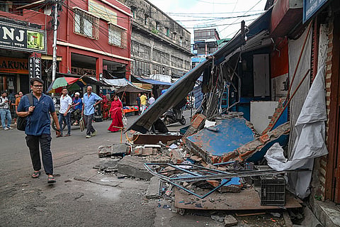A damaged portion of a market after the BJP supporters allegedly used a bulldozer to demolish a few meat shops in New Market area during a victory celebration, in Kolkata.