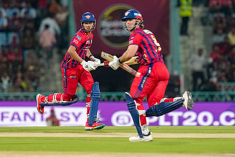 Lucknow Super Giants' Arshin Kulkarni, left, and Mitchell Marsh run between the wickets during the Indian Premier League (IPL) 2026 T20 cricket match between Lucknow Super Giants and Royal Challengers Bengaluru, in Lucknow, Uttar Pradesh.