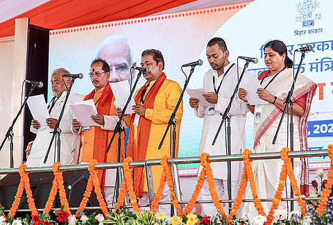 JD(U) leaders Shravan Kumar, Nishant Kumar and Leshi Singh, and BJP leaders Vijay Kumar Sinha and Dilip Jaiswal take oath during the swearing-in ceremony of the new Bihar cabinet of the National Democratic Alliance (NDA) government at Gandhi Maidan, in Patna. 