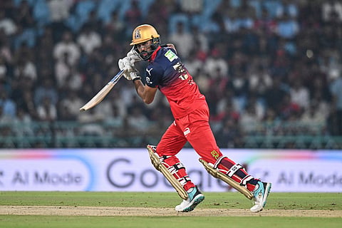 Royal Challengers Bengaluru's Devdutt Padikkal plays a shot during the Indian Premier League cricket match between Royal Challengers Bengaluru and Lucknow Super Giants in Lucknow, India.