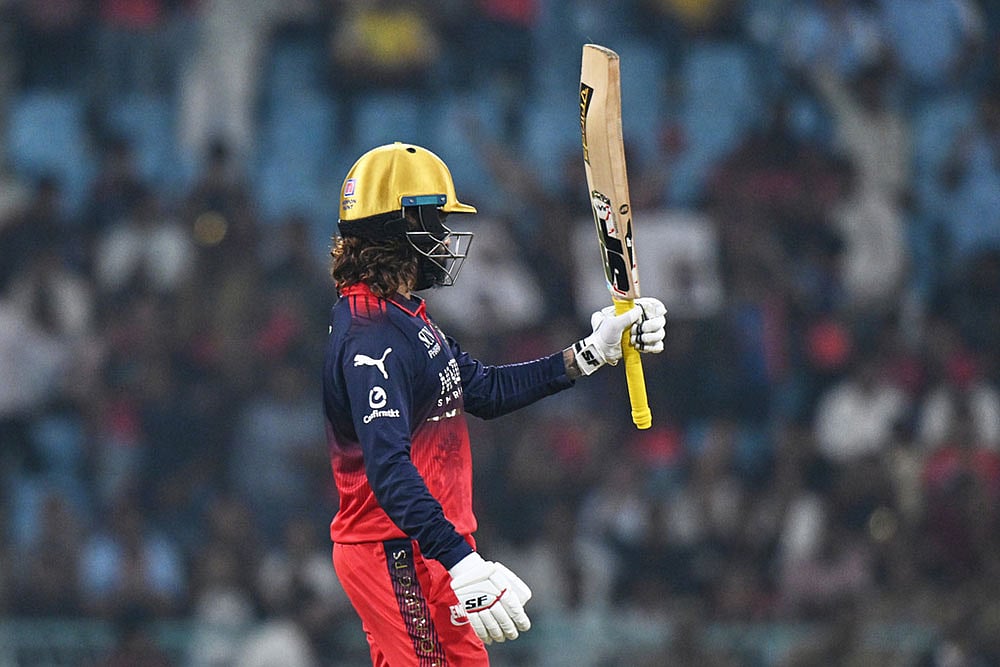 Royal Challengers Bengalurus captain Rajat Patidar celebrates his fifty runs IPL