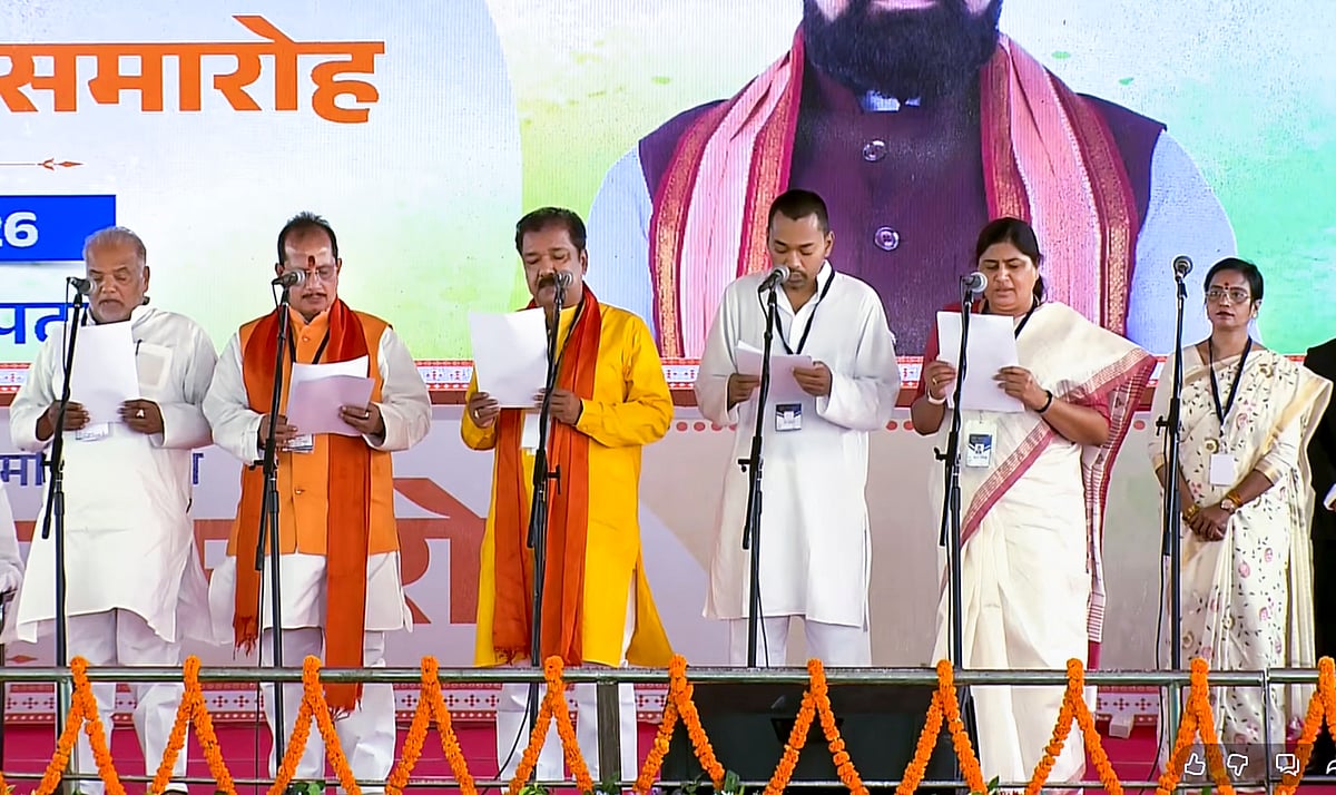 leaders Shravan Kumar and Nishant Kumar, BJP leader Vijay Kumar Sinha and others take oath during the oath-taking ceremony of ministers of the Bihar government at Gandhi Maidan, in Patna. - PTI