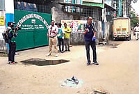 Bengal Police Suspect ‘Professional Shooters’ In Killing Of Suvendu Adhikari Aide | Photo: PTI : Forensic team officials investigate the crime scene following the killing of BJP leader Suvendu Adhikari's close aide Chandranath Rath, at Madhyamgram, in North 24 Parganas district, West Bengal.
