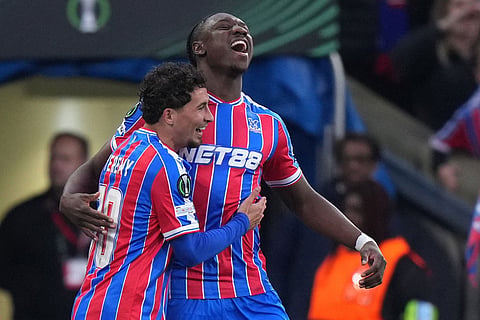 Crystal Palace's Yeremy Pino, left, celebrates with Crystal Palace's Jaydee Canvot after scores a disallowed goal during the Conference League semifinal second leg soccer match between Crystal Palace and Shakhtar Donetsk, in London.