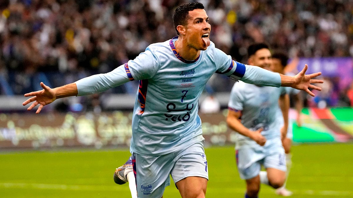 Al Nassr's Cristiano Ronaldo celebrates after scoring at the King Saud University Stadium, in Riyadh, Saudi Arabia, Jan. 19, 2023.  - | Photo: AP/Hussein Malla