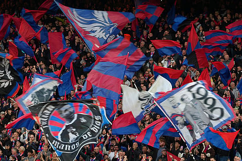 Crystal Palace fans support their team prior to the Conference League semifinal second leg soccer match between Crystal Palace and Shakhtar Donetsk, in London.