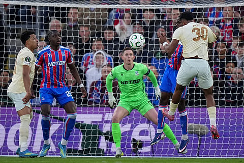 Shakhtar's Alisson, right, heads the ball during the Conference League semifinal second leg soccer match between Crystal Palace and Shakhtar Donetsk, in London.