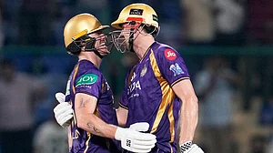 AP Photo/Manish Swarup : Kolkata Knight Riders' Finn Allen, left, is congratulated by teammate Cameron Green for completing his century during their Indian Premier League cricket match against Delhi Capitals in New Delhi, India, Friday, May 8, 2026.