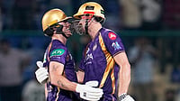 AP Photo/Manish Swarup : Kolkata Knight Riders' Finn Allen, left, is congratulated by teammate Cameron Green for completing his century during their Indian Premier League cricket match against Delhi Capitals in New Delhi, India, Friday, May 8, 2026. 