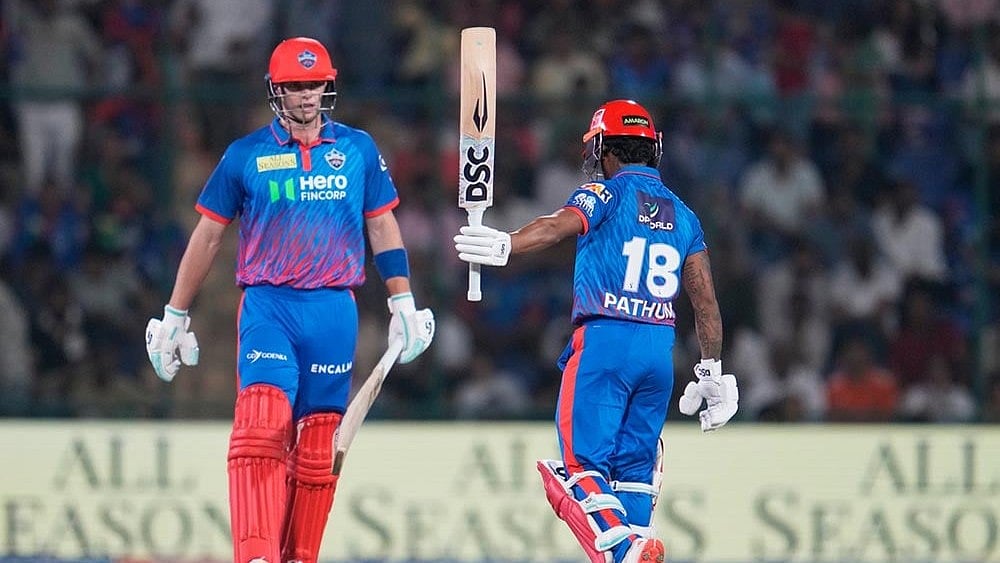Delhi Capitals' Pathum Nissanka, right, celebrates his fifty runs during the Indian Premier League cricket match between Delhi Capitals and Kolkata Knight Riders in New Delhi. - | Photo: AP/Manish Swarup