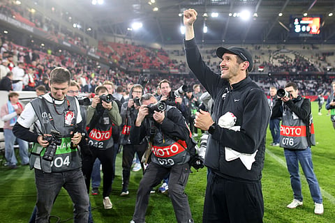 Freiburg coach Julian Schuster celebrates after the team won the Europa League second leg semifinal soccer match between SC Freiburg  and SC Braga in Freiburg, Germany.
