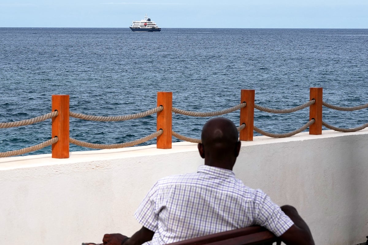 The MV Hondius cruise ship departs the port in Praia, Cape Verde, Wednesday, May 6, 2026 - Misper Apawu