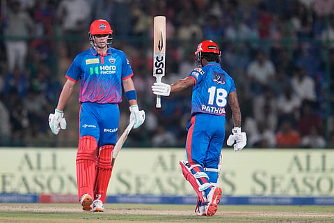 Delhi Capitals' Pathum Nissanka, right, celebrates his fifty runs during the Indian Premier League cricket match between Delhi Capitals and Kolkata Knight Riders in New Delhi.