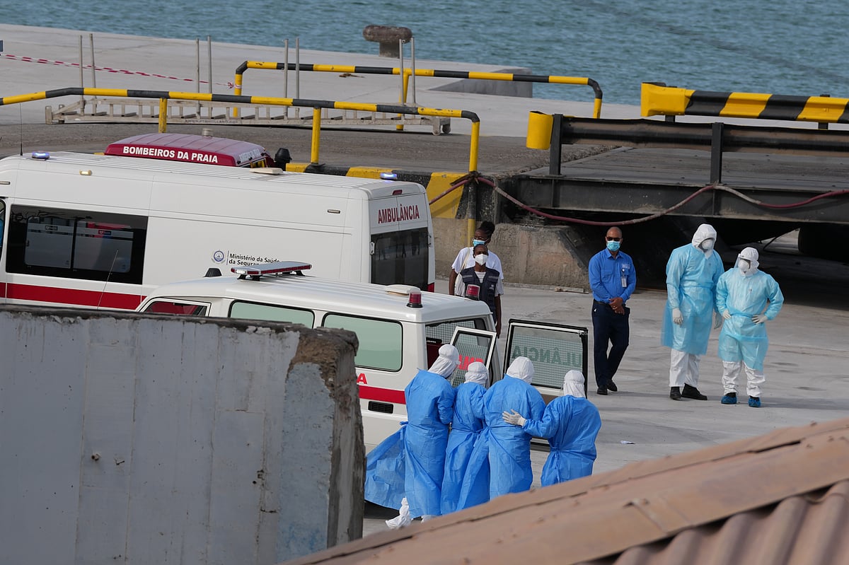 Health workers in protective gear evacuate patients from the MV Hondius cruise ship at a port in Praia, Cape Verde, Wednesday, May 6, 2026.  -  AP