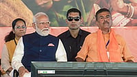 @NarendraModi/YT via PTI Photo)(PTI05_09_2026_000079B) : In this screengrab from a video posted on May 9, 2026, Prime Minister Narendra Modi with West Bengal chief minister-elect Suvendu Adhikari during the oath-taking ceremony, at Brigade Parade Ground in Kolkata, West Bengal. 