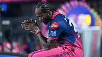 RR Vs GT Live Score, IPL 2026: Jofra Archer’s Wild Opening Over Hands Titans Flying Start | Gujarat 82/0 (6) | Photo: AP : Rajasthan Royals' Jofra Archer rests during the Indian Premier League cricket match between Rajasthan Royals and Sunrisers Hyderabad in Jaipur.