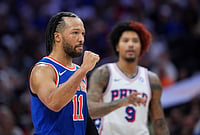 Philadelphia 76ers Vs New York Knicks, Conference Semifinals: Knicks Take Commanding 3-0 Lead | Photo: AP/Matt Slocum : New York Knicks' Jalen Brunson, left, reacts past Philadelphia 76ers' Kelly Oubre Jr. during the first half of Game 3 in a second-round NBA basketball playoff series in Philadelphia.