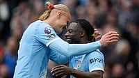 Photo: AP/Dave Thompson : Jeremy Doku, right, celebrates with Erling Haaland after scoring the opening goal during the English Premier League match between Manchester City and Brentford in Manchester.