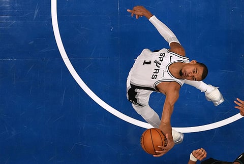 San Antonio Spurs forward Victor Wembanyama (1) grabs a rebound during the second half of Game 3 of a NBA basketball second-round playoff series against the Minnesota Timberwolves, in Minneapolis.