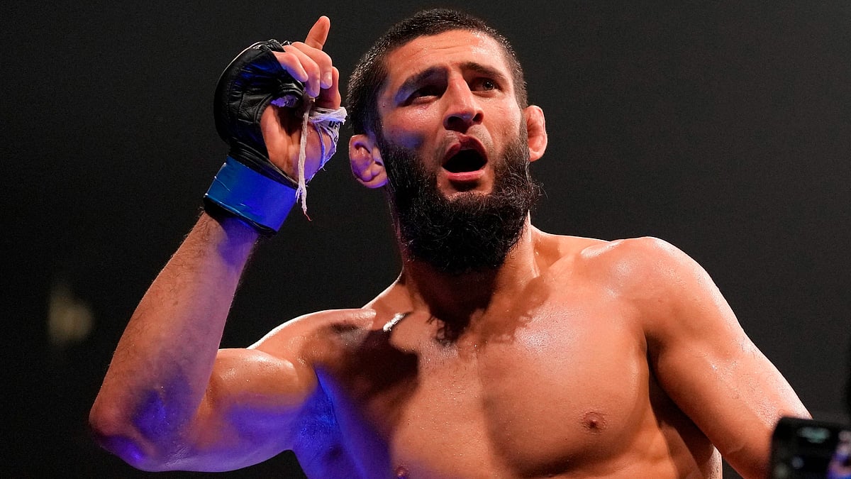 Khamzat Chimaev of the United Arab Emirates, celebrates after he beats Kamaru Usman of Nigeria, in the UFC middleweight championship fight at the Ethihad Arena in Abu Dhabi. - AP Photo
