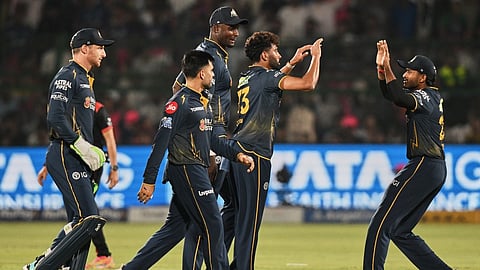 Mohammed Siraj, centre, celebrates with teammates the wicket of Vaibhav Sooryavanshi during the Indian Premier League match between Rajasthan Royals and Gujarat Titans in Jaipur.