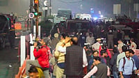 Fourth IPL-Linked Death Reported In Delhi After Another Fatal Road Accident | Photo: PTI/Salman Ali : Emergency services personnel at the spot after a blast occurred in a parked car near Red Fort, leaving multiple vehicles in flames, in New Delhi.
