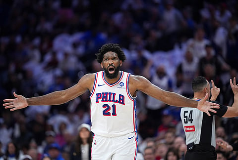 Philadelphia 76ers' Joel Embiid reacts after a foul call during the first half of Game 3 in a second-round NBA basketball playoff series against the New York Knicks in Philadelphia.