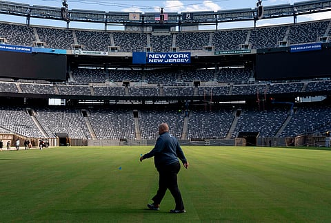 FIFA Senior Pitch Manager David Graham walks during the pitch installation for FIFA World Cup 2026 at NYNJ Stadium in East Rutherford, New Jersey.
