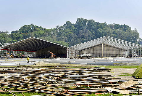 Preparations underway ahead of the swearing-in ceremony of the new Assam government, at Veterinary College Playground, in Guwahati.