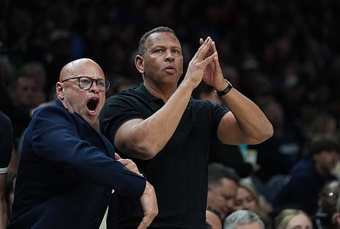 Minnesota Timberwolves co-owner Alex Rodriguez, right, reacts to a call during the second half of Game 3 of a NBA basketball second-round playoff series between the San Antonio Spurs and the Minnesota Timberwolves in Minneapolis.
