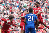 | Photo: AP/Ian Hodgson : Liverpool's Joe Gomez shoots a header during the Premier League soccer match between Liverpool and Chelsea in Liverpool, England.