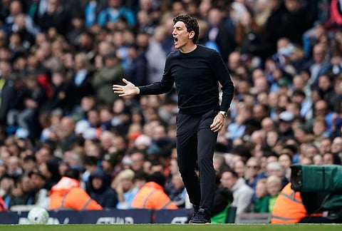 Brentford's head coach Keith Andrews reacts during the English Premier League soccer match between Manchester City and Brentford in Manchester.