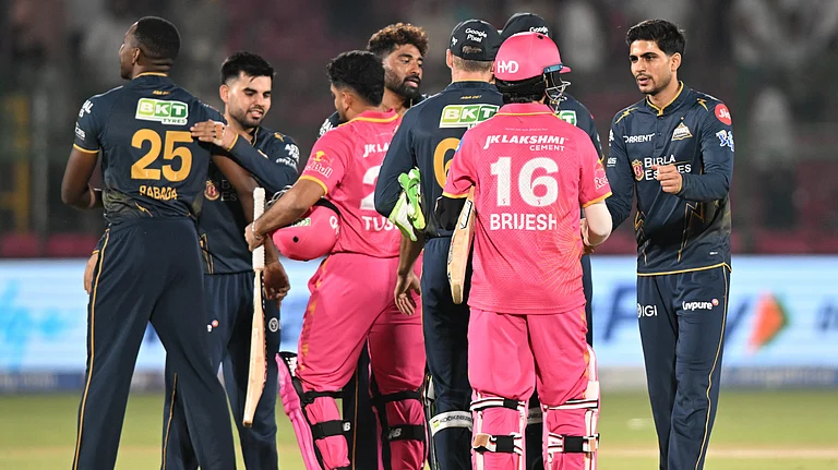 Gujarat Titans' captain Shubman Gill, right, meets Rajasthan Royals players after winning the Indian Premier League cricket match between Rajasthan Royals and Gujarat Titans in Jaipur. - AP Photo