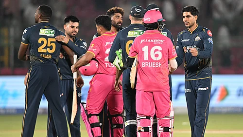 AP Photo : Gujarat Titans captain Shubman Gill, right, meets Rajasthan Royals players after winning the Indian Premier League cricket match between Rajasthan Royals and Gujarat Titans in Jaipur.