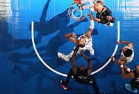 Minnesota Timberwolves Vs San Antonio Spurs, Conference SF: Wembanyama Powers Spurs To Crucial 2-1 Series Lead | Photo: AP/Abbie Parr : Minnesota Timberwolves forward Jaden McDaniels (3), top, shoots over San Antonio Spurs forward Victor Wembanyama (1), middle, during the second half of Game 3 of a NBA basketball second-round playoff series, in Minneapolis.