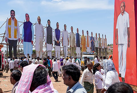 Cut outs of Union Minister Pralhad Joshi and other BJP leaders placed during the celebration of BS Yediyurappa’s 50 years of political career at Chitradurga, Karnataka.